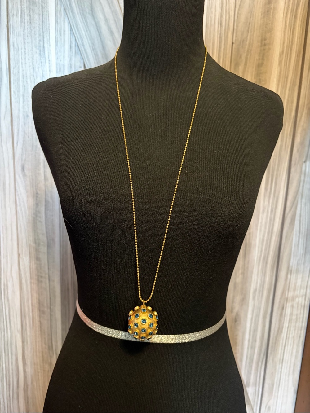 Tory Burch Celestial Locket Necklace.
